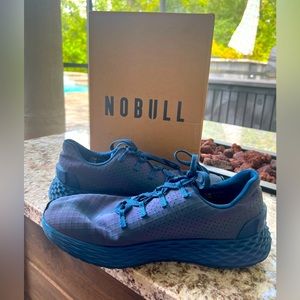 NOBULL Ripstop Runner shoes in Iridescent Blue.